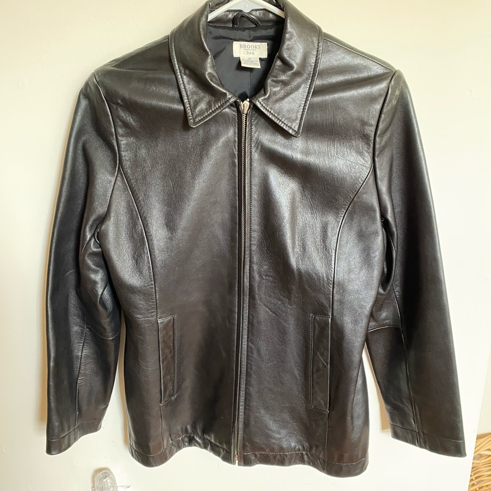 Like new XS black leather Brooks Brothers jacket. Maybe worn once. Fits like S.